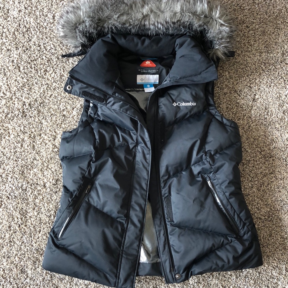 Black Columbia vest with faux fur detachable hood.